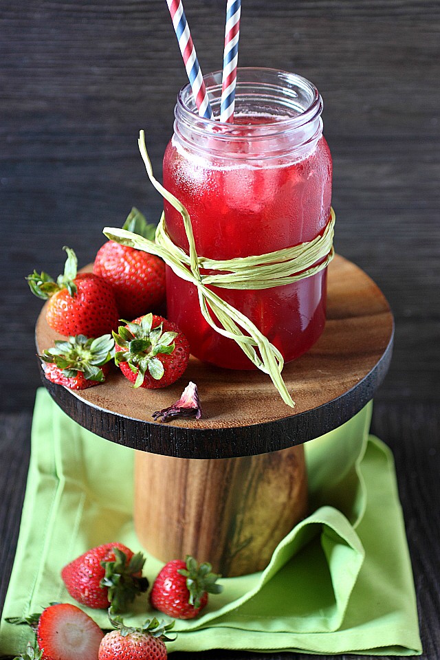 Make your summer sparkle with this deliciously effervescent Strawberry Hibiscus Soda! Tart and fruity, floral and fragrant – Bring this to every summer gathering! {mind-over-batter.com}