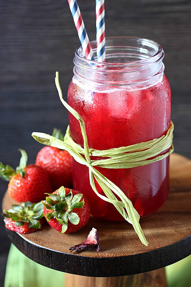 Make your summer sparkle with this deliciously effervescent Strawberry Hibiscus Soda! Tart and fruity, floral and fragrant – Bring this to every summer gathering! {mind-over-batter.com}