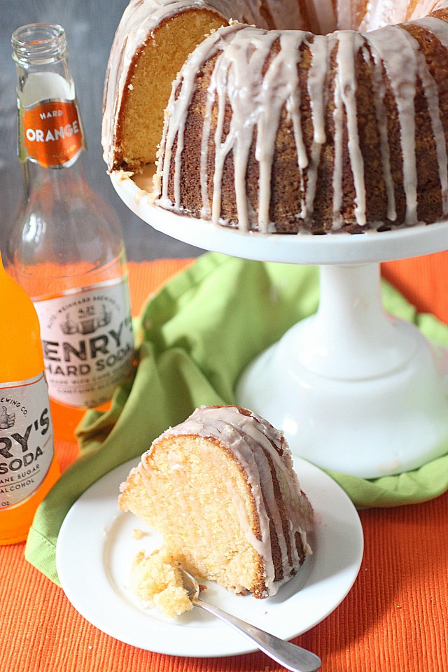 This Hard Orange Soda Bundt Cake gets its sass from vanilla infused citrus, and its springy fluffiness from a boozy carbonated hard orange soda. Glazed with more vanilla infused citrus, this bundt cake is perfect for popping up at a friend’s house for a cool afternoon of girly chatter!