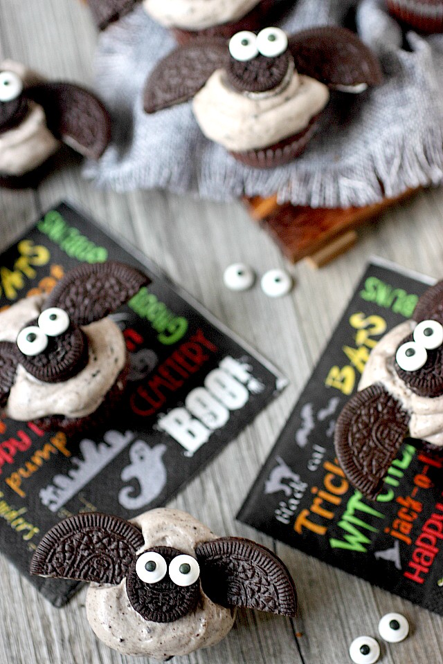 Halloween treats just got a cuter with these Chocolate Cookies –N- Cream Mini Bat Cupcakes! Moist mini chocolate cupcakes are frosted with a lip-smacking cookies –n – cream frosting and topped with adorable Oreo cookie bats! Take them to your next Halloween party. They are guaranteed to be hit! www.mind-over-batter.com