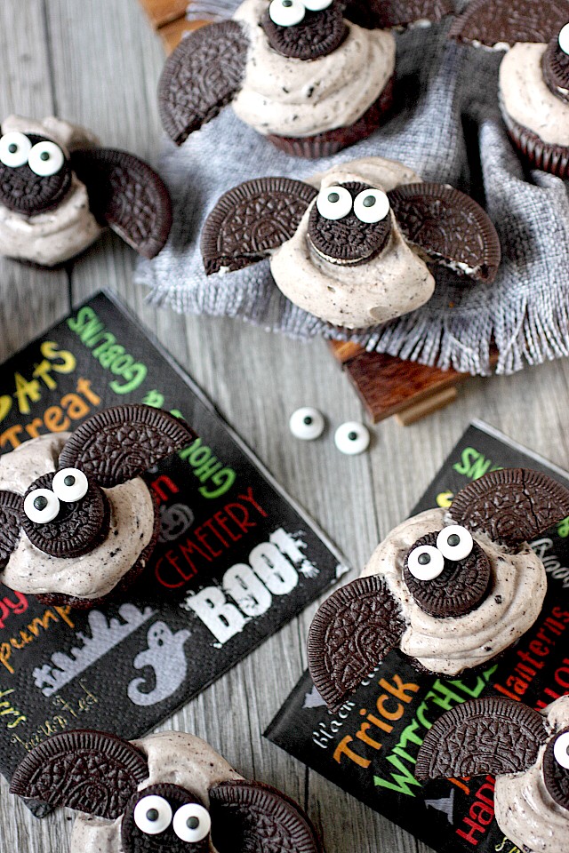 Halloween treats just got a cuter with these Chocolate Cookies –N- Cream Mini Bat Cupcakes! Moist mini chocolate cupcakes are frosted with a lip-smacking cookies –n – cream frosting and topped with adorable Oreo cookie bats! Take them to your next Halloween party. They are guaranteed to be hit! www.mind-over-batter.com