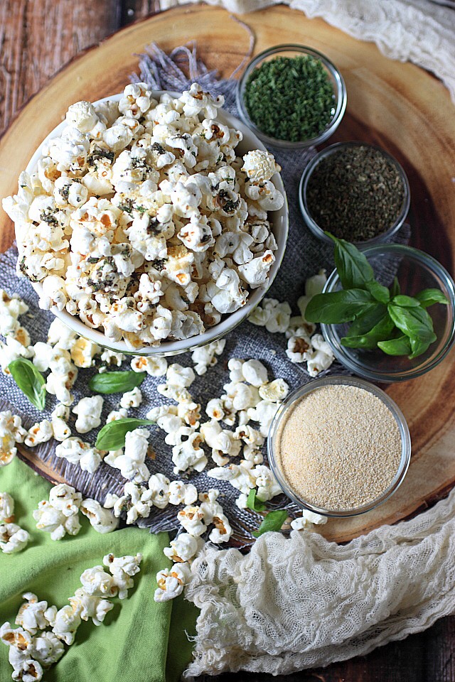 Gather ‘round, people – Your snacking experience is about to get AMAZING! THIS Garlic Bread Popcorn. All the flavors of deliciously addictive garlic bread – Basil, parsley, oregano and TONS of garlic – Mixed into popped corn kernels. And did I mention…? Panko breadcrumbs are added to this popcorn for a heightened garlic bread experience!  Make a batch and it will be gone in minutes! www.mind-over-batter.com