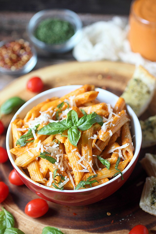 Spicy... Cheesy... Boozy... Robust. This Penne Alla Vodka is all this and more! Make this for dinner tonight! www.mind-over-batter.com
