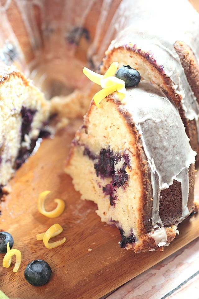 Tender sour cream pound cake swirled with fresh macerated blueberries and a tart cheesecake. Want a slice? www.mind-over-batter.com
