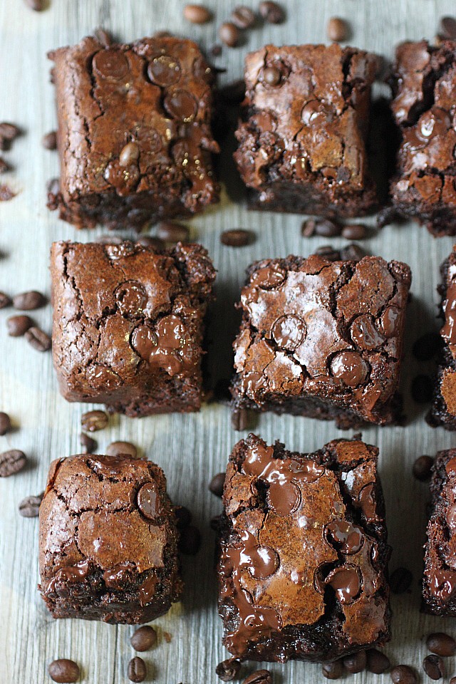 Need a jolt? Look no further than these Gooey Espresso Brownies! Gooey chocolate infused with espresso will wake you up and give you the sugar jolt you need to get through the day! www.mind-over-batter.com
